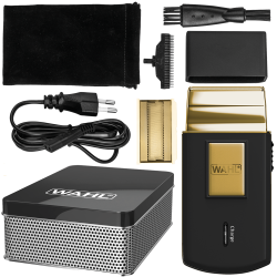 Zawartość luksusowego zestawu Wahl Travel Shaver Gold w metalowym pudełku.