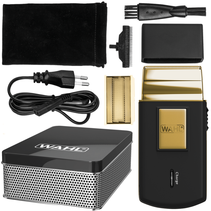 Zawartość luksusowego zestawu Wahl Travel Shaver Gold w metalowym pudełku.