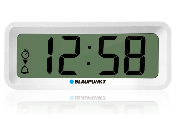 Zegarek Blaupunkt CL04WH przymocowany na magnes do metalowej powierzchni.